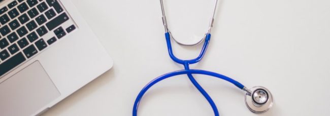 laptop with a stethoscope